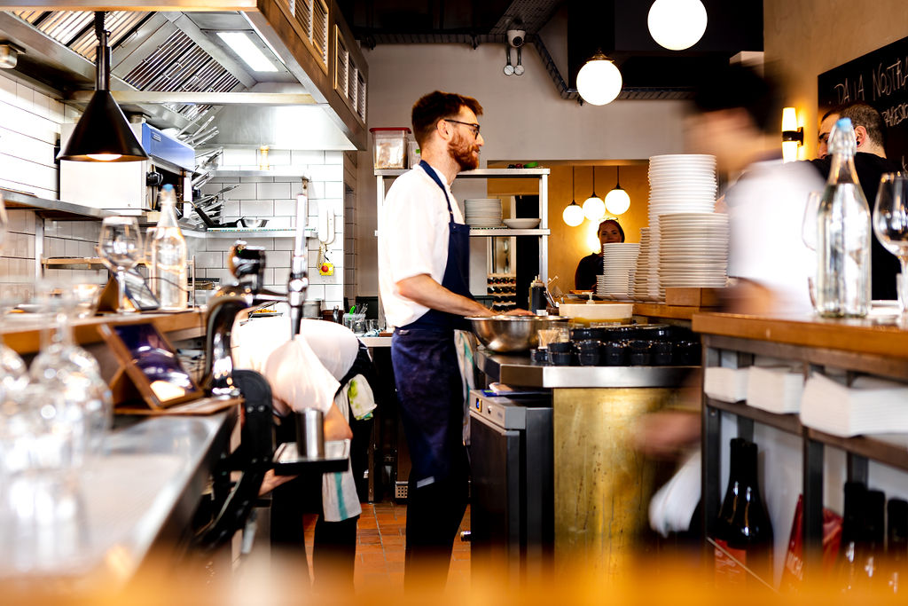 Chefs working in restaurant kitchen